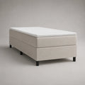 Lit 1 place en tissu beige avec sommier tapissier, matelas et surmatelas blancs, 90 × 200 cm